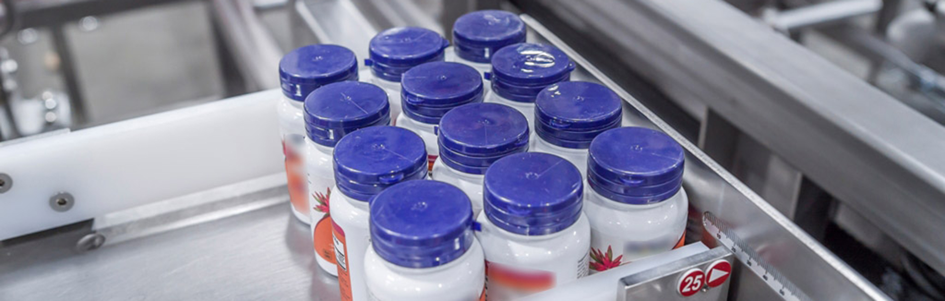 Vitamin Bottle Case Packer Machine - Tishma Technologies